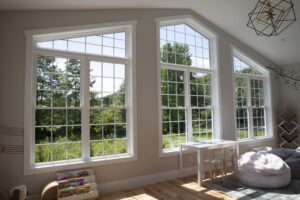 A large window with a beautiful park view 