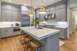 Large kitchen with island and grey kitchen cabinets