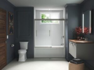 Tub to shower conversion in grey bathroom