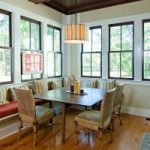 corner of dining room with double-hung windows